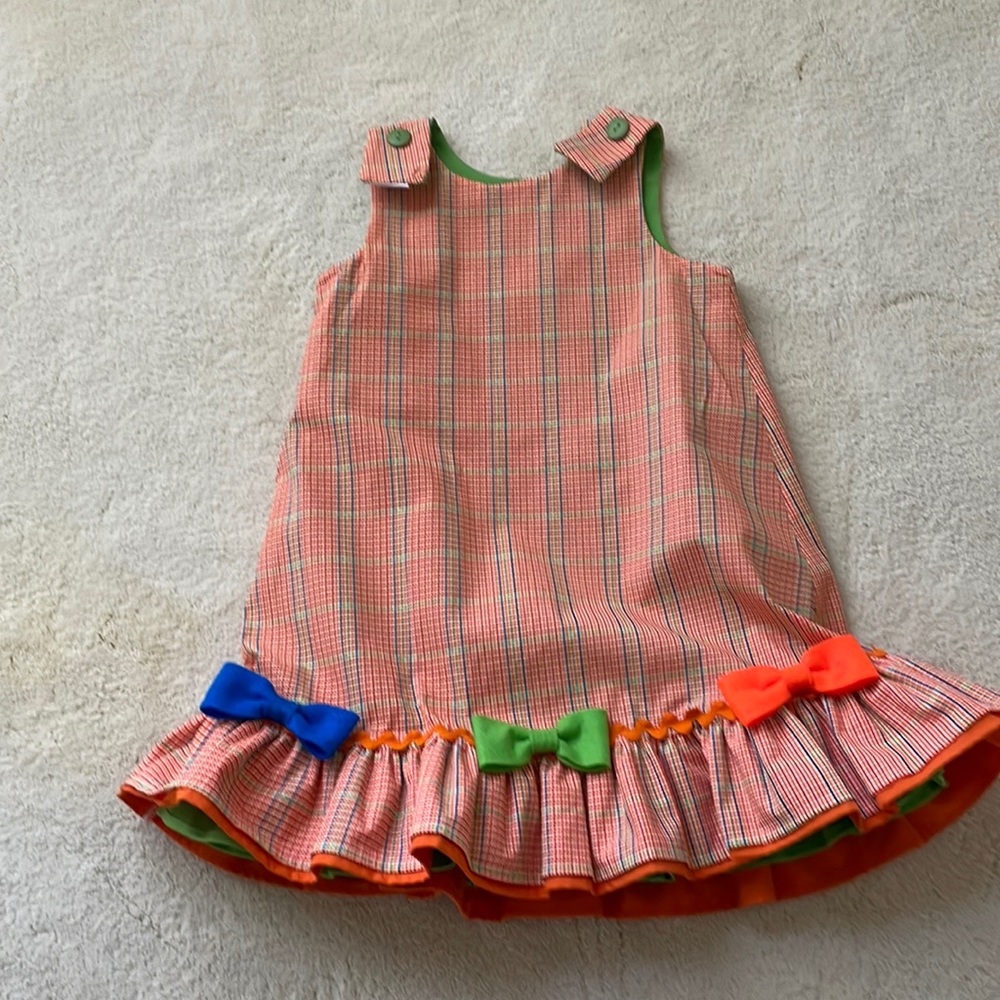 Reversible dress for fall with pumpkin or spring with adorable bows